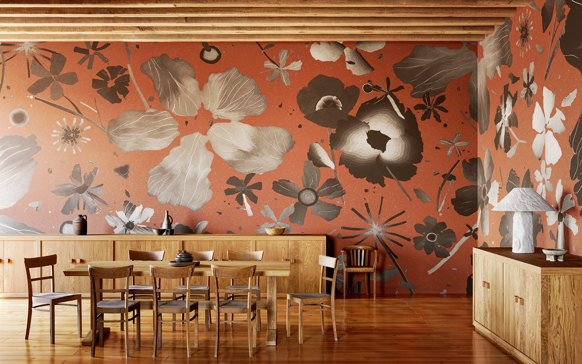 Dining room with a floral mural wall, wooden table and chairs, and wooden cabinets, featuring a modern lamp on a sideboard.