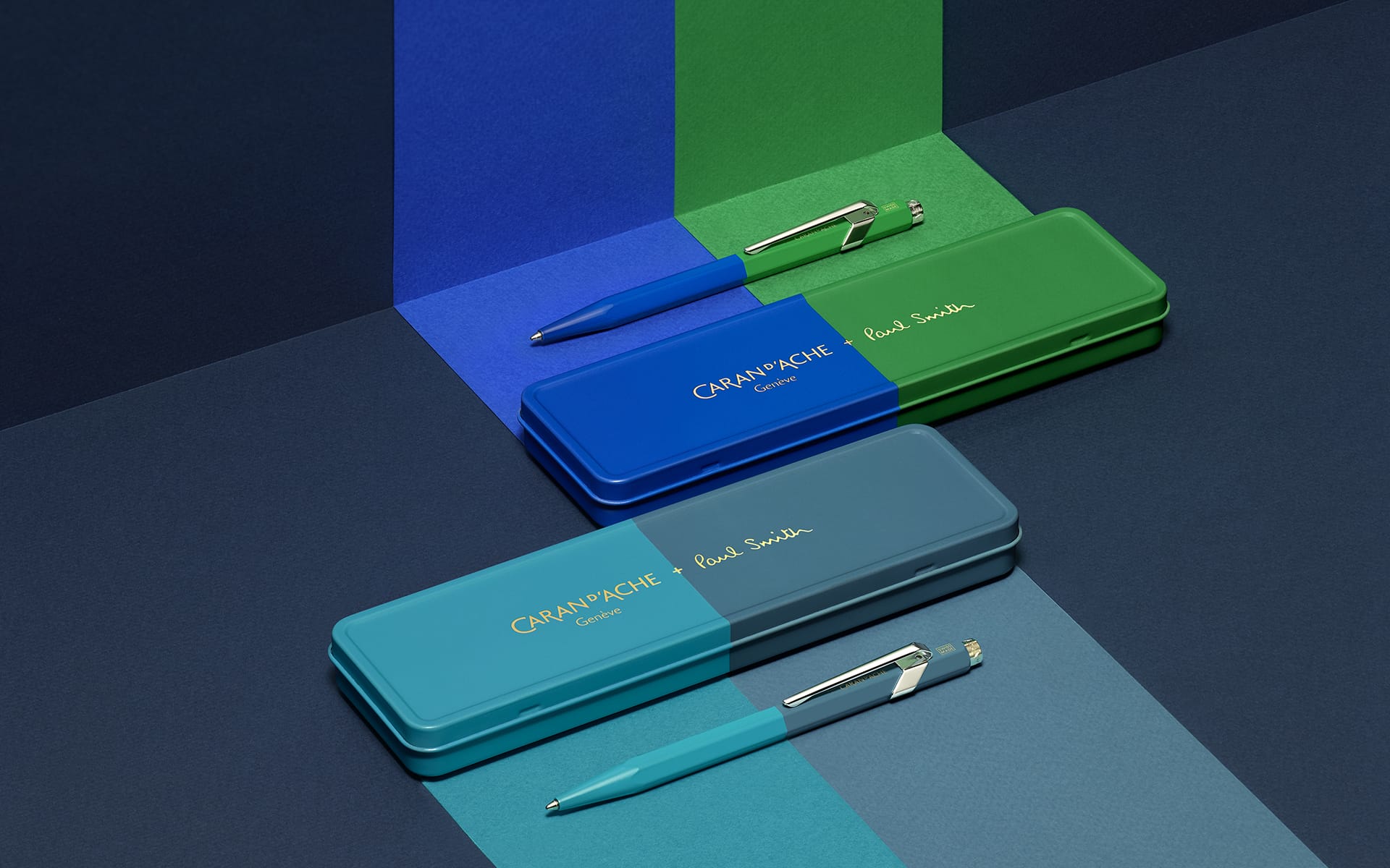 Colorful pen cases and pens arranged on a patterned surface.