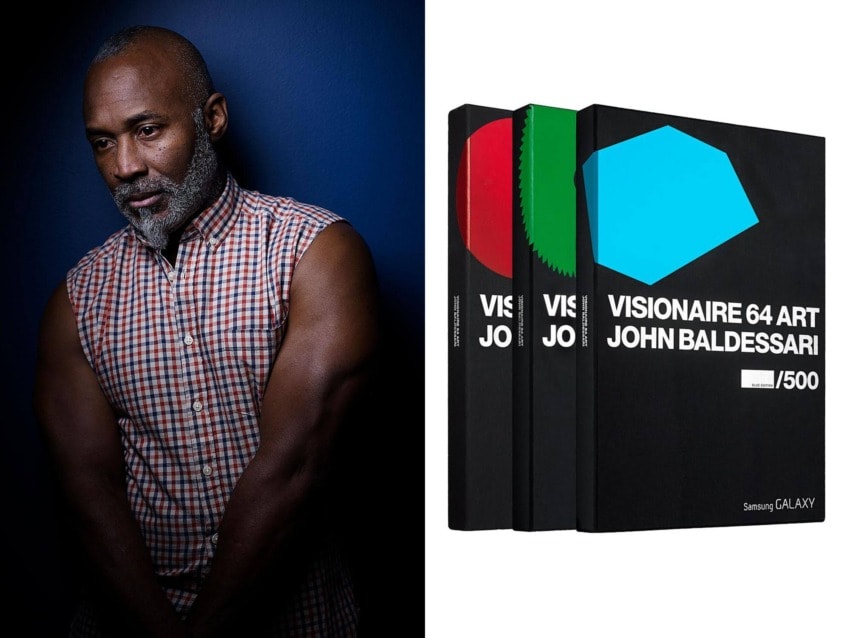 Person in sleeveless plaid shirt next to three book covers titled "Visionaire 64 Art John Baldessari" with colorful geometric shapes.