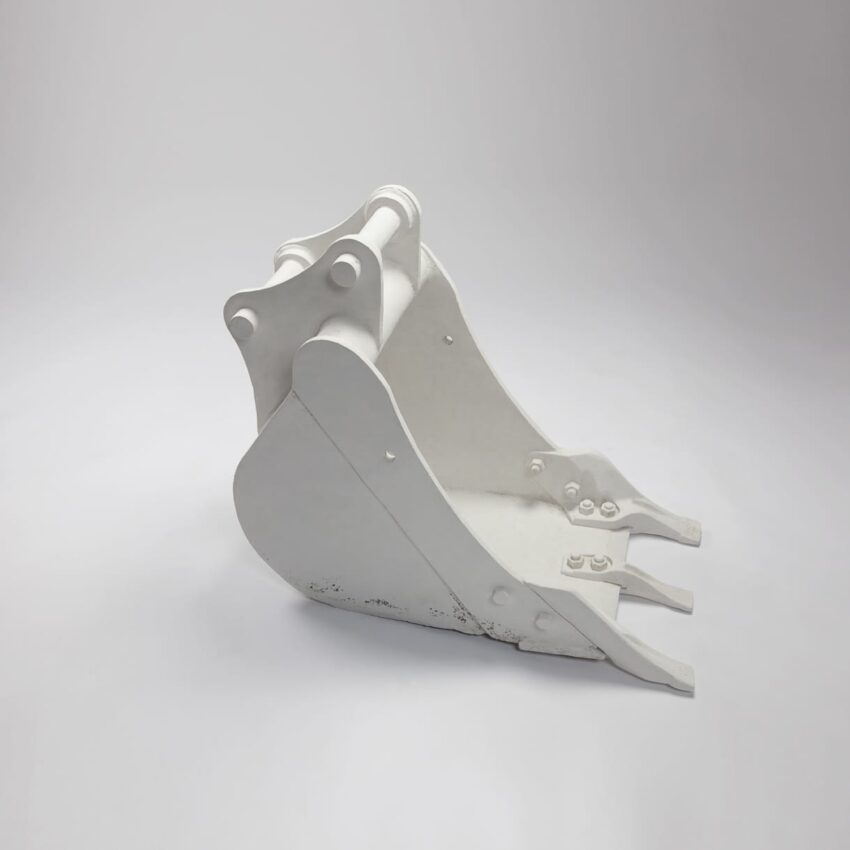 White excavator bucket on a plain background.
