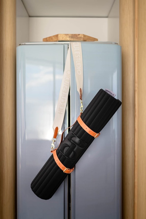 Yoga and exercise mat accessories by Hercule Studio.