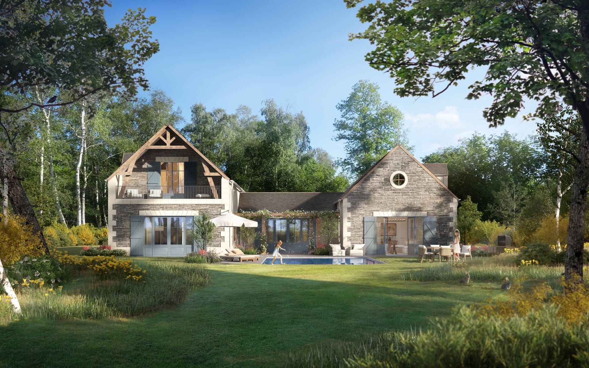 Charming stone house with large windows and pool in a lush garden surrounded by trees under a clear blue sky.