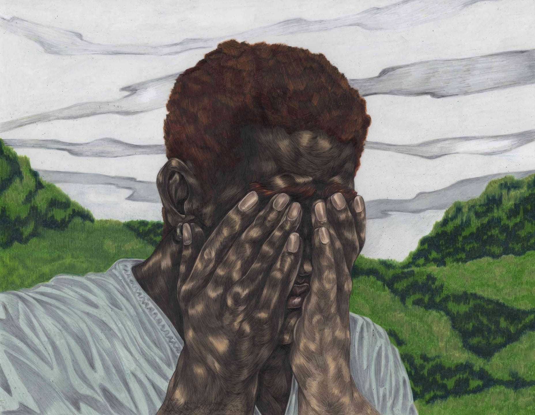 Person covering their face with hands, surrounded by green hills and a cloudy sky.