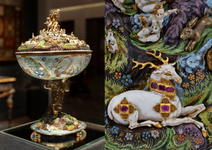 Intricately detailed ornamental cup with relief carvings of animals and figures, showcasing fine artistry and craftsmanship.