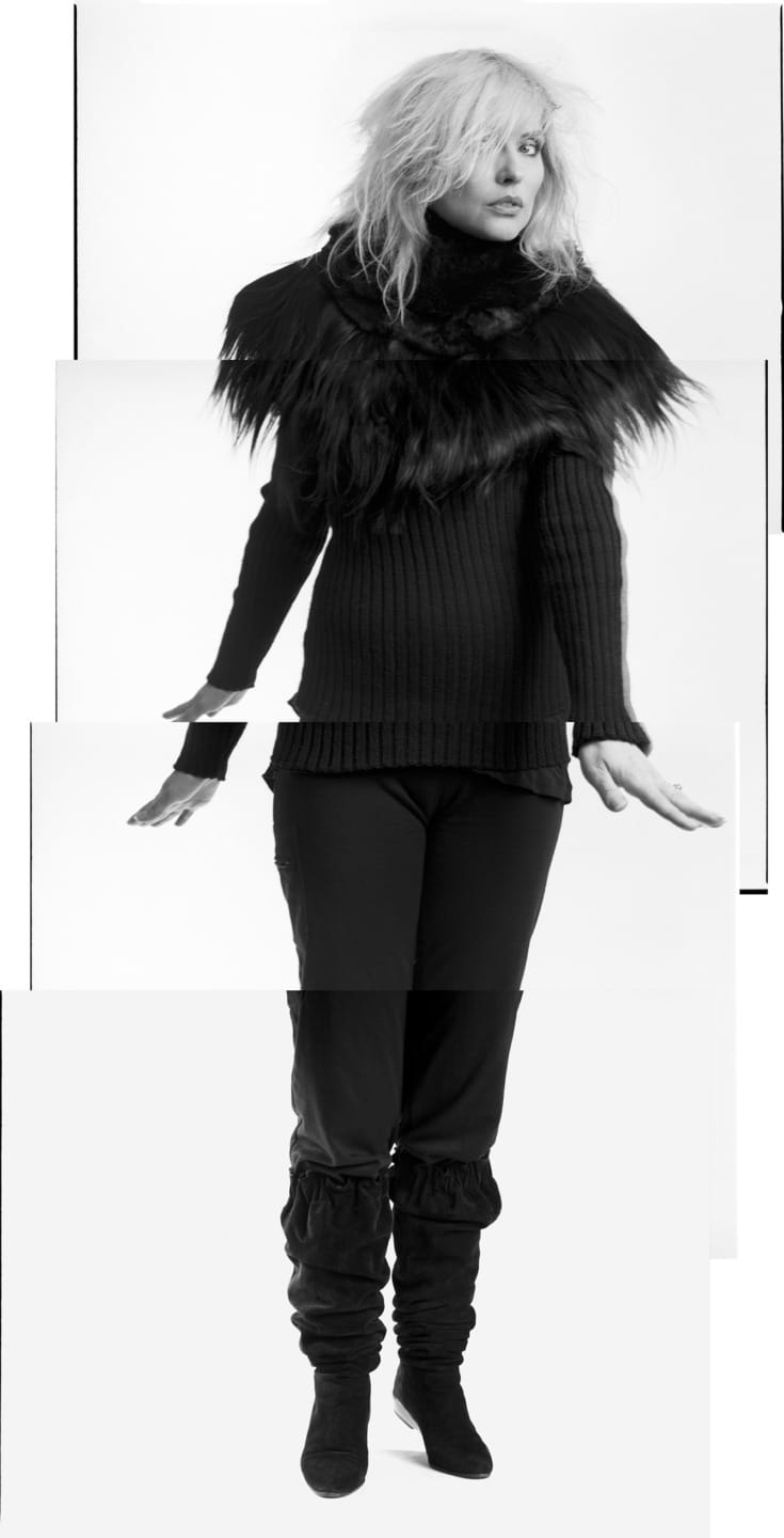 Fashionable person in a black sweater with faux fur collar, black pants, and boots, posing in a stylish, artistic collage.