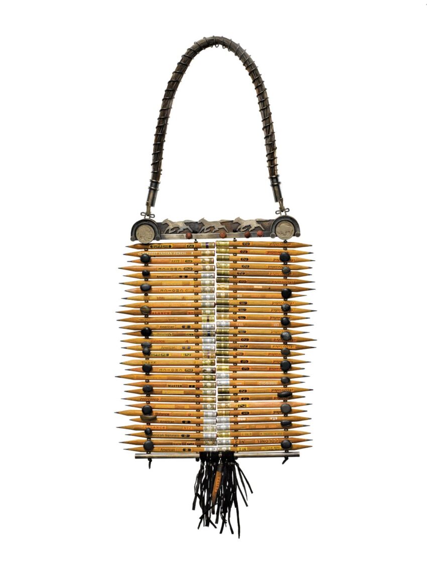 Handcrafted purse made from stacked yellow pencils with decorative black accents and a textured black handle.