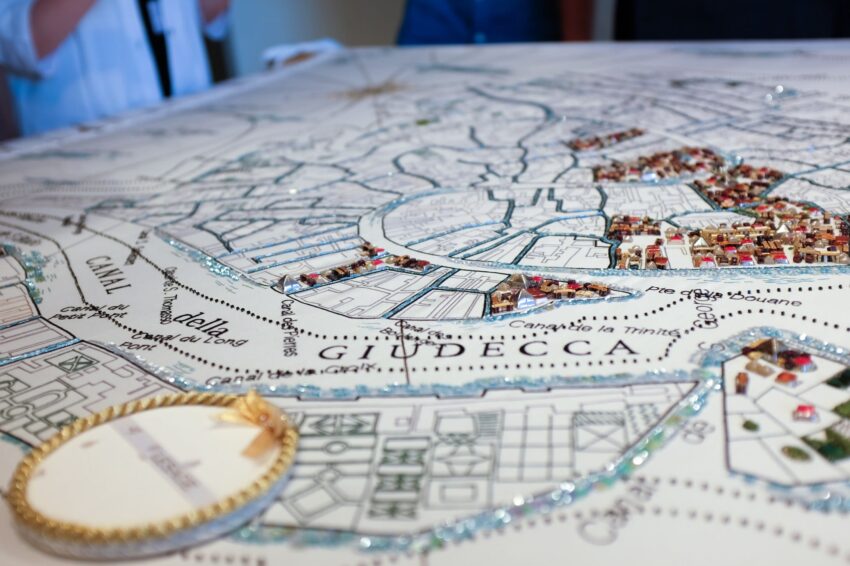 Detailed map of Giudecca, Italy with colorful illustrative elements and surrounding water, viewed from a close angle.