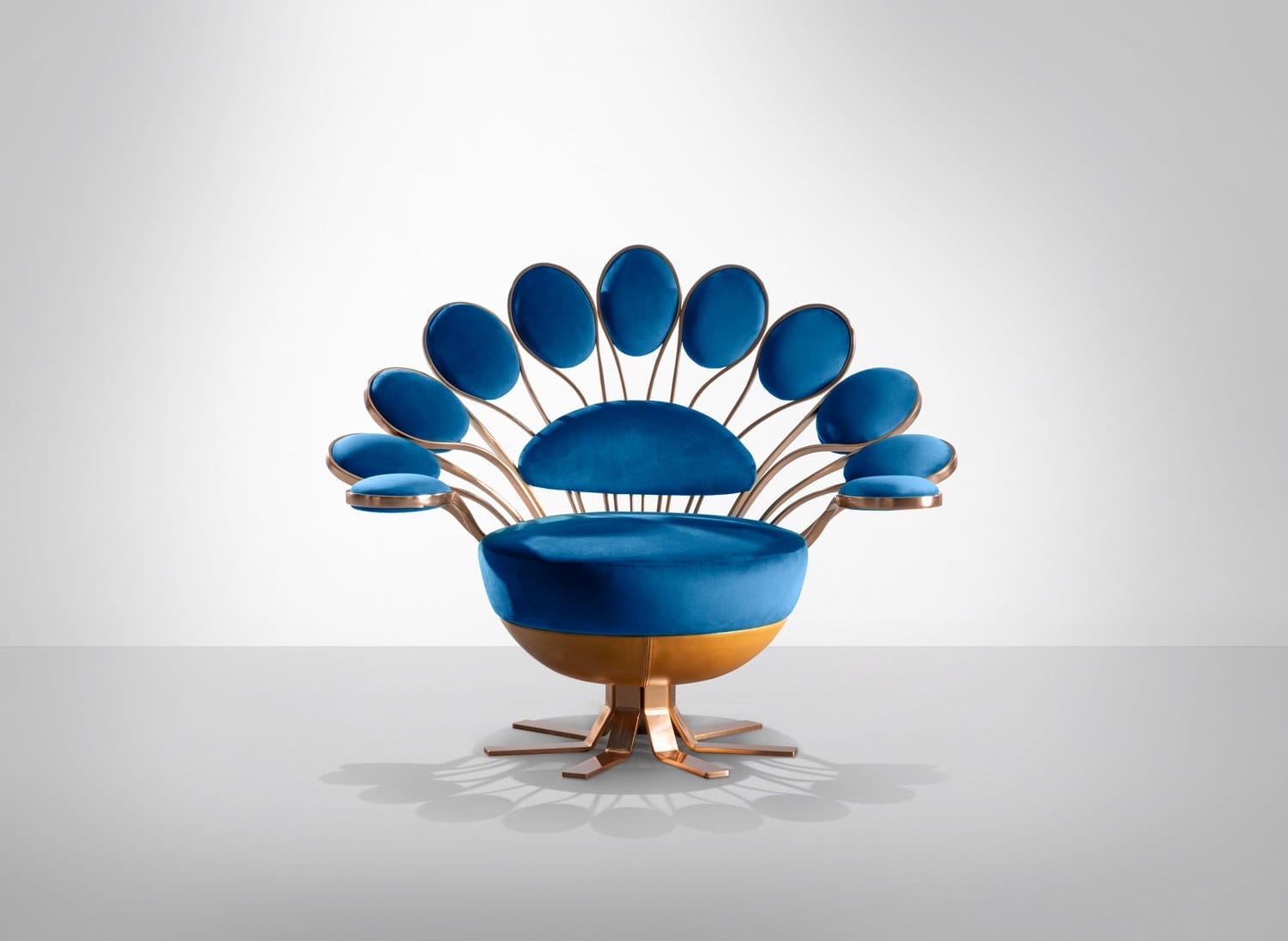 Designer Marc Ange Unveils Dazzling Peacock-Inspired Chairs in