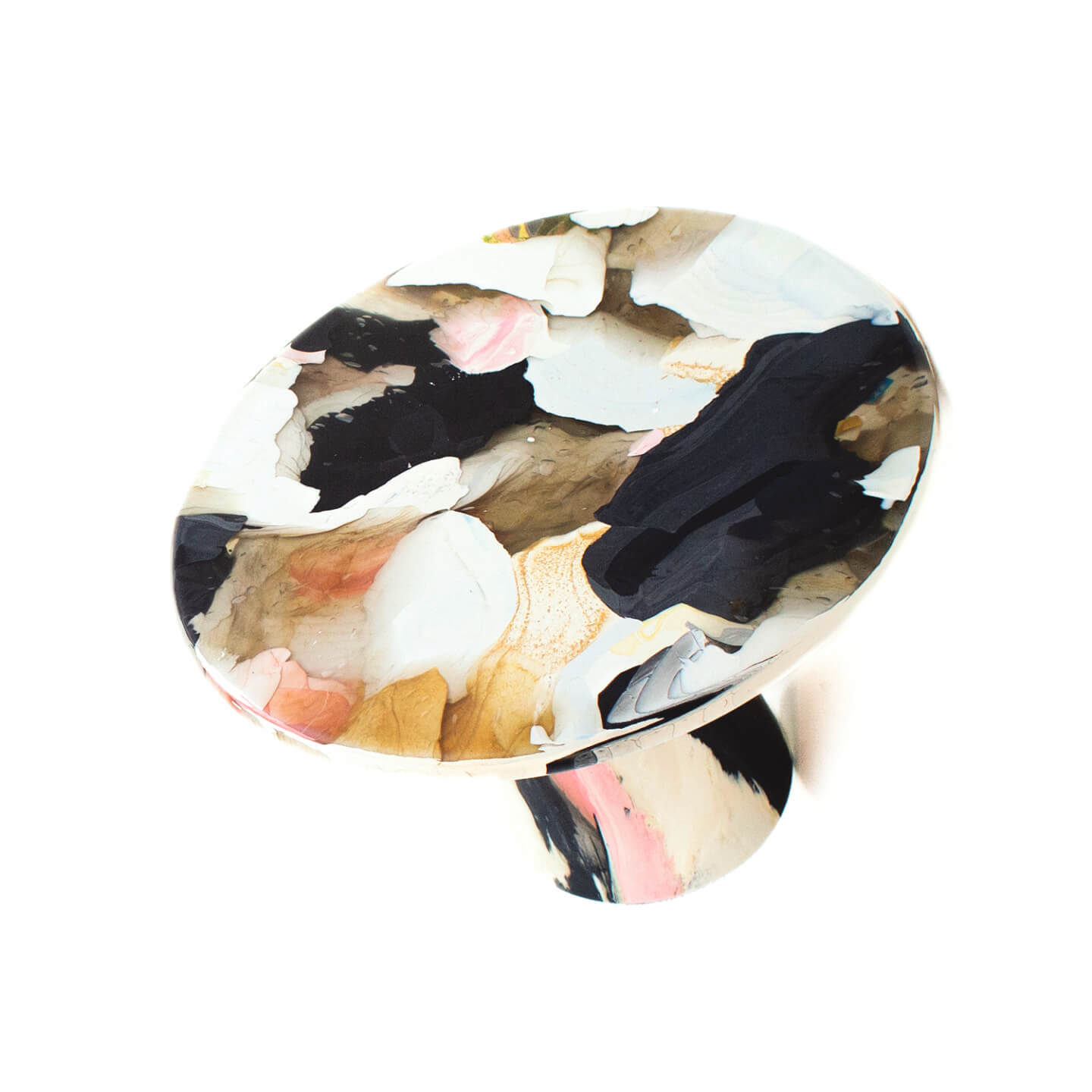 Abstract multicolored pedestal with swirling patterns in black, white, and pink hues, featuring a unique, artistic design.