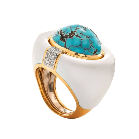 Gold and white ring with a large turquoise stone and diamond accents.