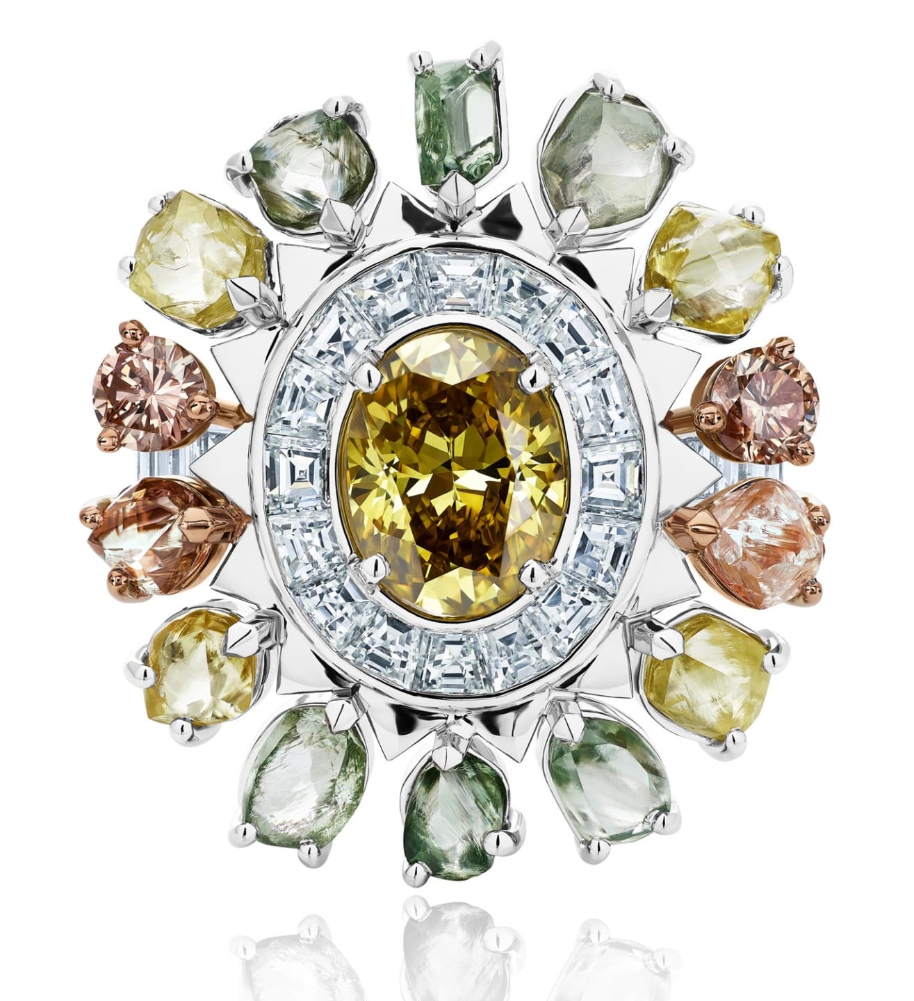 Intricate circular brooch with multicolored gemstones, featuring a large central yellow gem, surrounded by smaller stones.