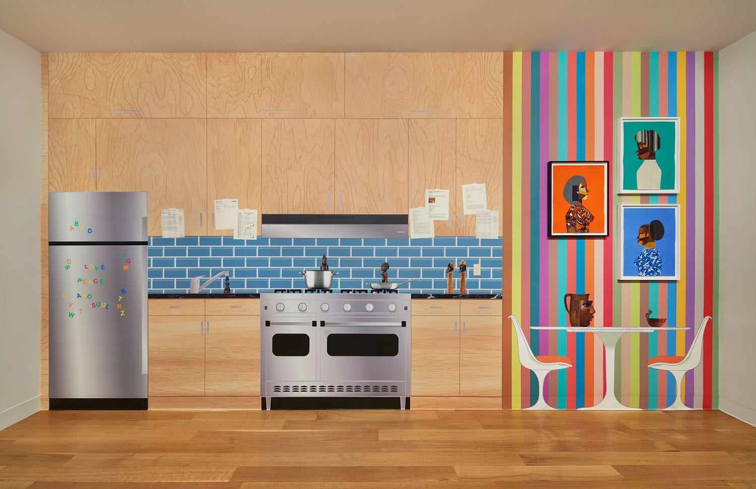 Colorful kitchen with modern appliances, wooden cabinets, blue backsplash, and vibrant wall art next to a dining area.
