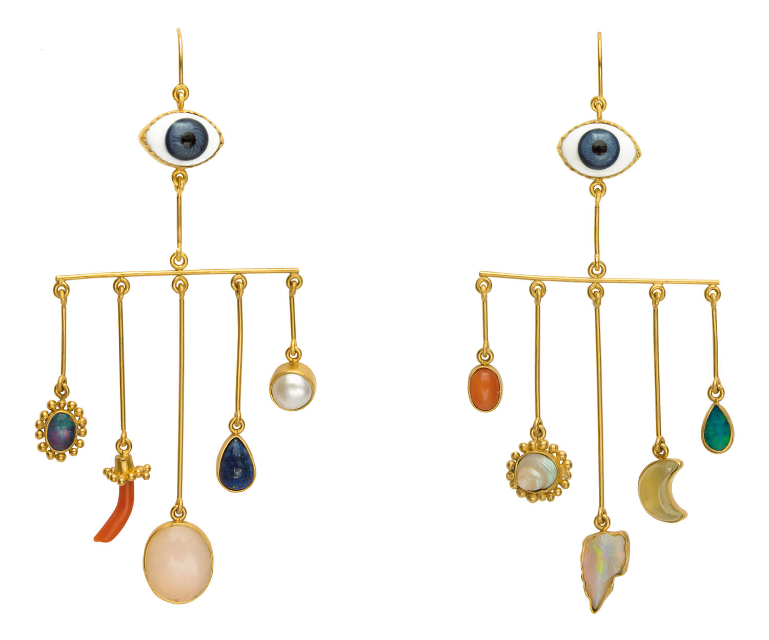 Gold earrings with eye motif and hanging gemstones, including pearls and opals, arranged on a white background.