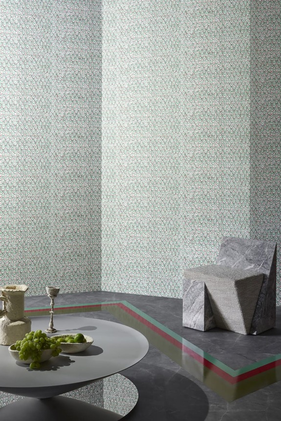 modern interior with geometric chair round table with fruits and decanter intricate wall pattern multicolored floor border