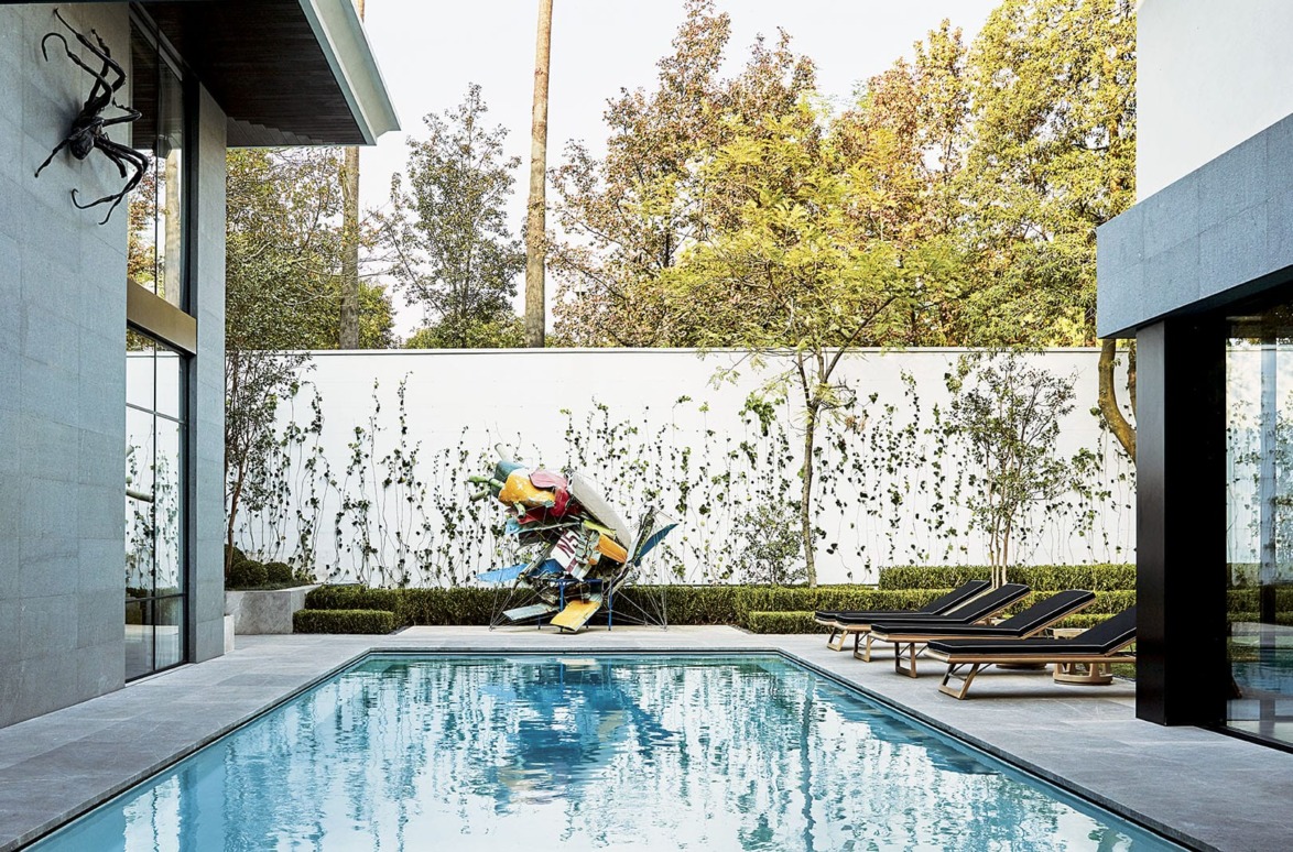 Though López’s collection is international, he is credited with helping to promote Mexican artists such as Abraham Cruzvillegas, who created the sculpture of found materials displayed next to López’s pool.