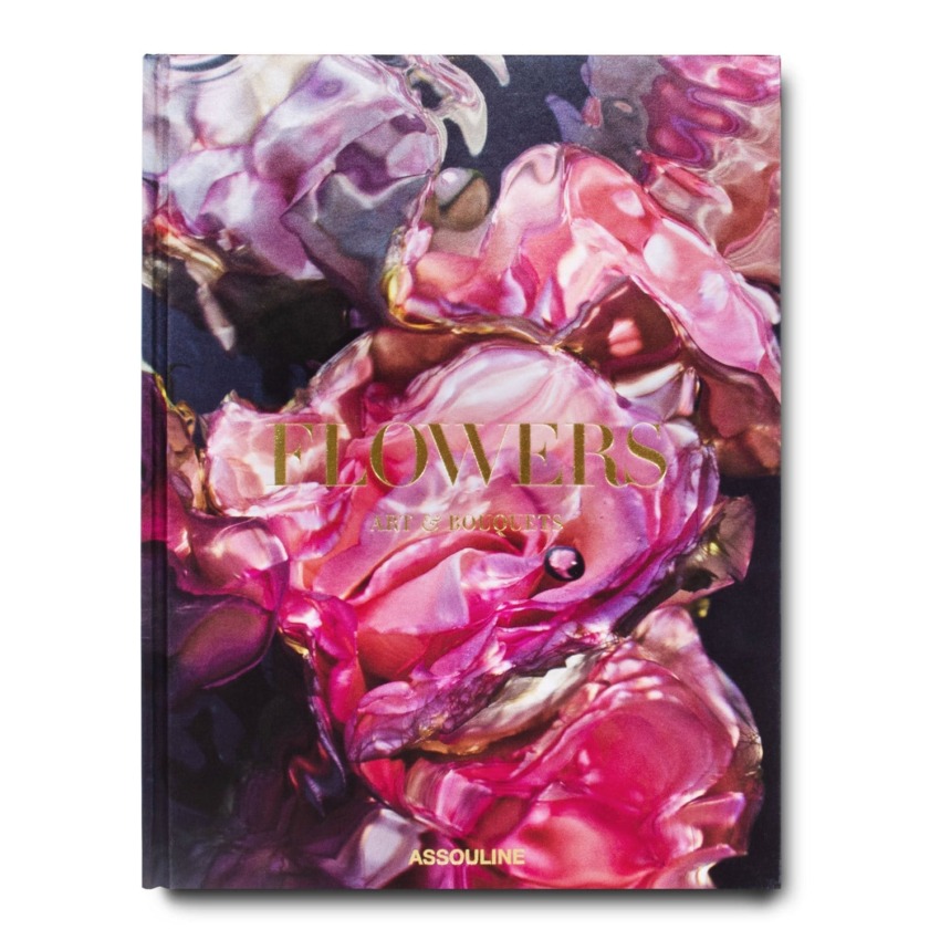 Book cover with abstract floral artwork featuring pink and purple hues, titled "Flowers" by Assouline.