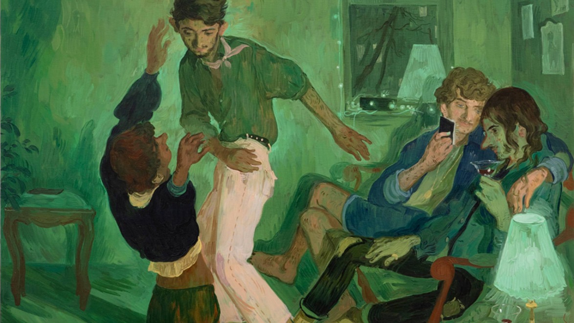 A group of people in a room with green lighting, one is dancing while others are sitting and engaged in conversation.