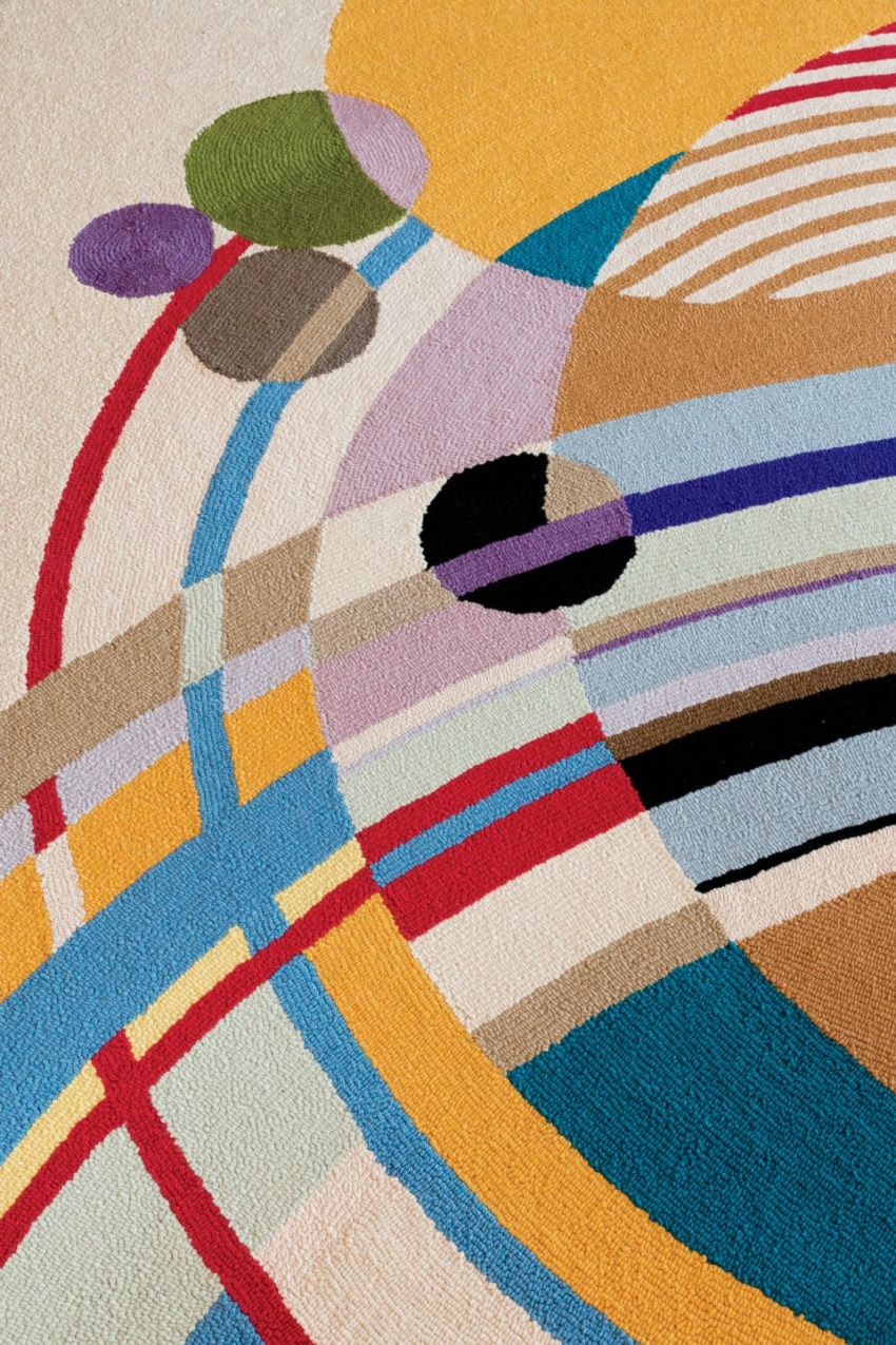 The colorful circular March Balloons rug was reproduced to replace the original sold at auction in 2010. The geometric pattern is inspired by a series of covers for Liberty magazine that Wright designed in the 1920s