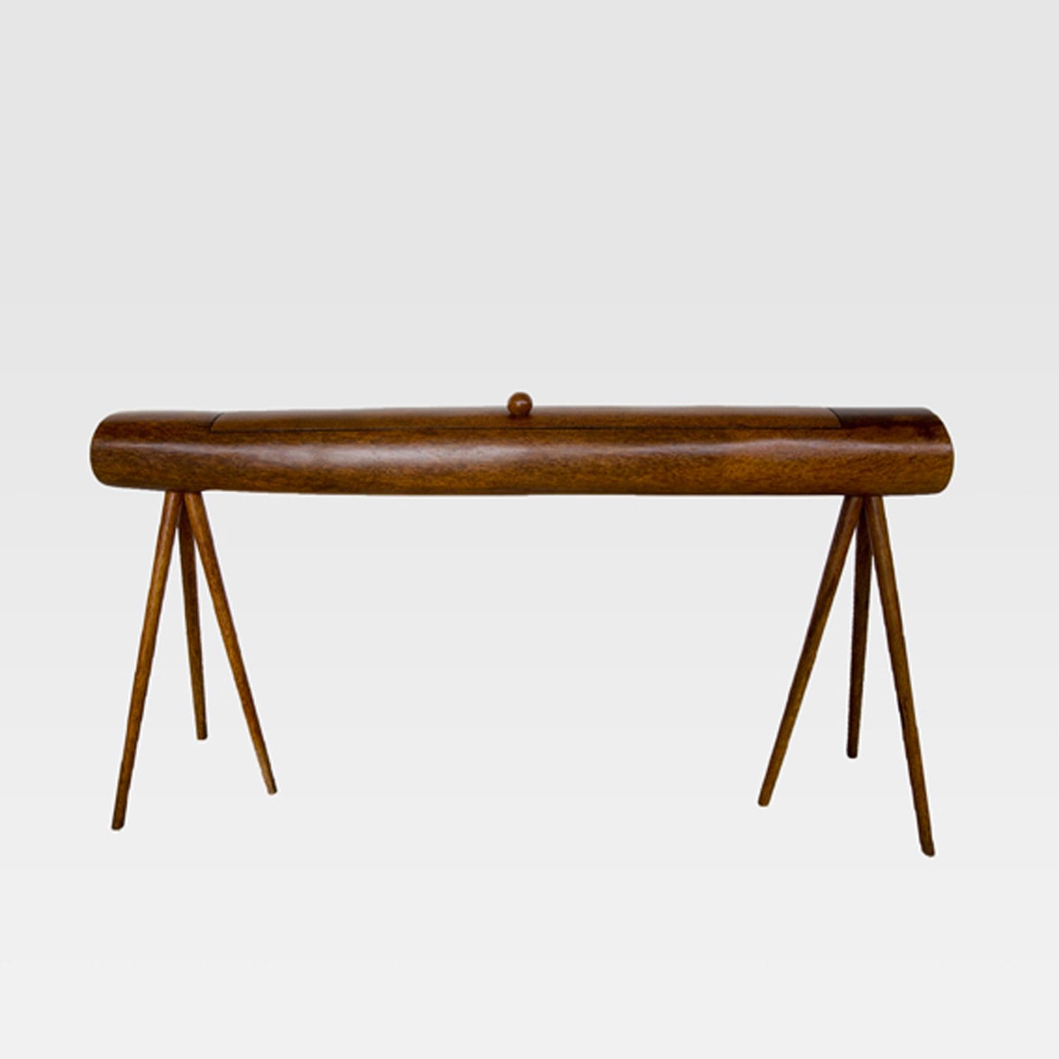 Wooden log-shaped table with four angled legs against a plain background.