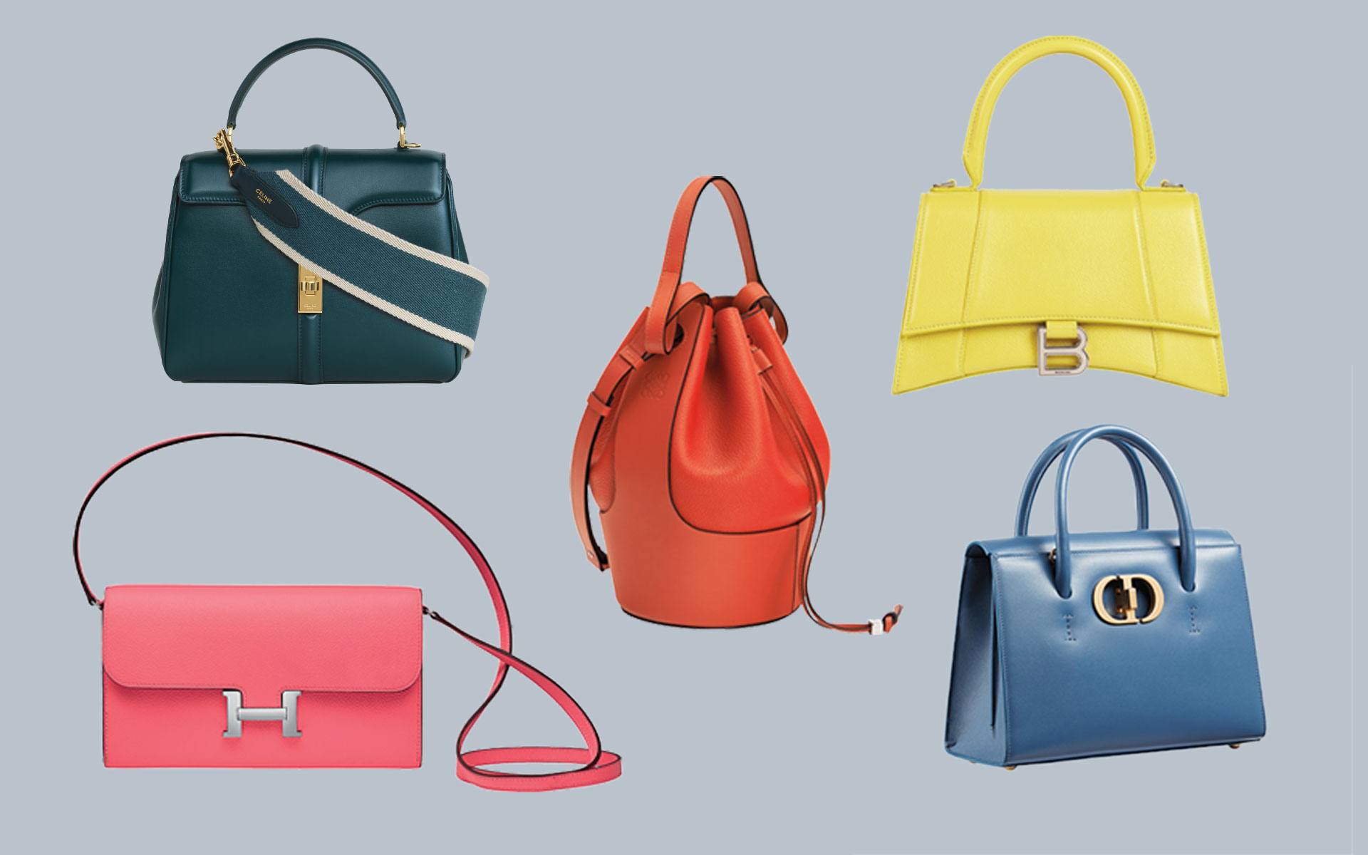 Collection of five stylish handbags in various colors and styles on a soft blue background.