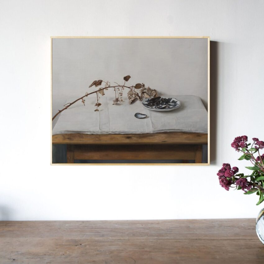 A painting of a minimalist still life with dried branch, bowl on a table, and small vase with purple flowers in foreground