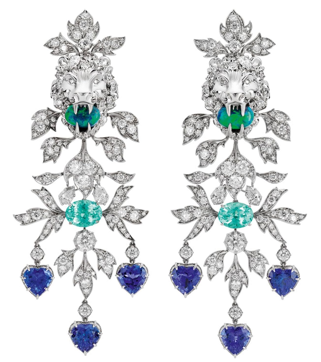 Intricate diamond earrings with lion motif, featuring emerald, sapphire, and turquoise gemstones in a floral design.