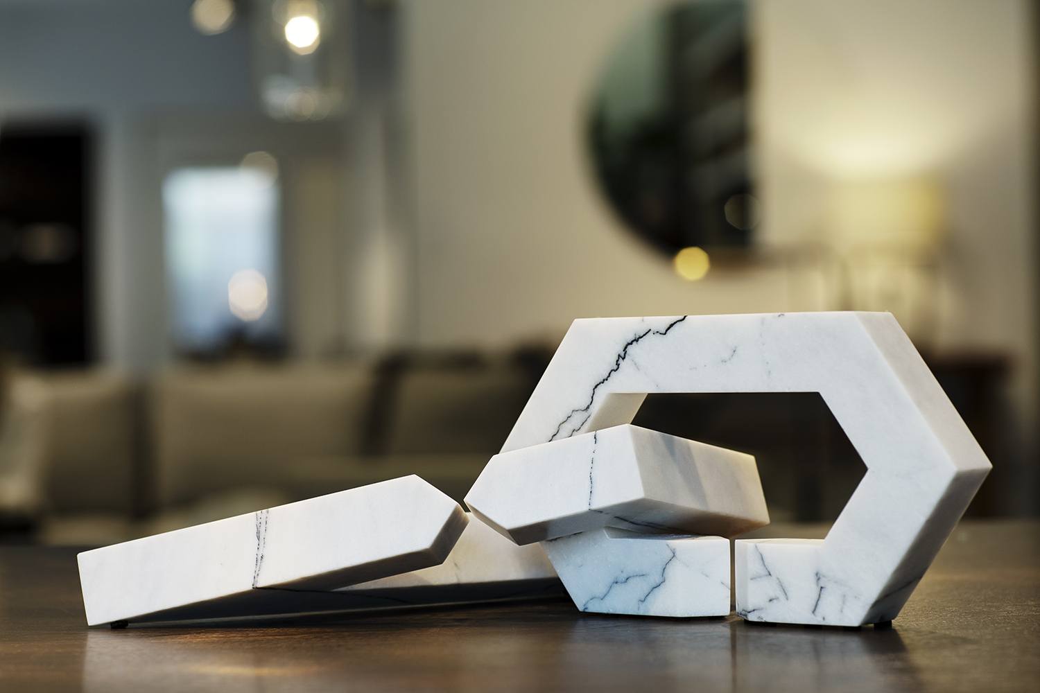 The Hero Link sculpture, inspired by an Eva Fehren clasp design, is made from Solvenian lilac marble.