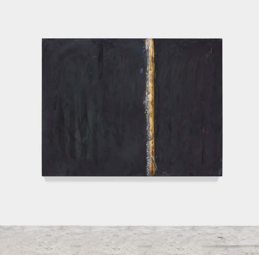abstract painting with dark tones and a vertical gold stripe on a light wall background
