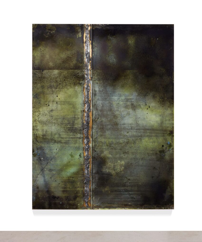 Abstract painting with earthy tones and textures, featuring a vertical dividing line on a gallery wall.