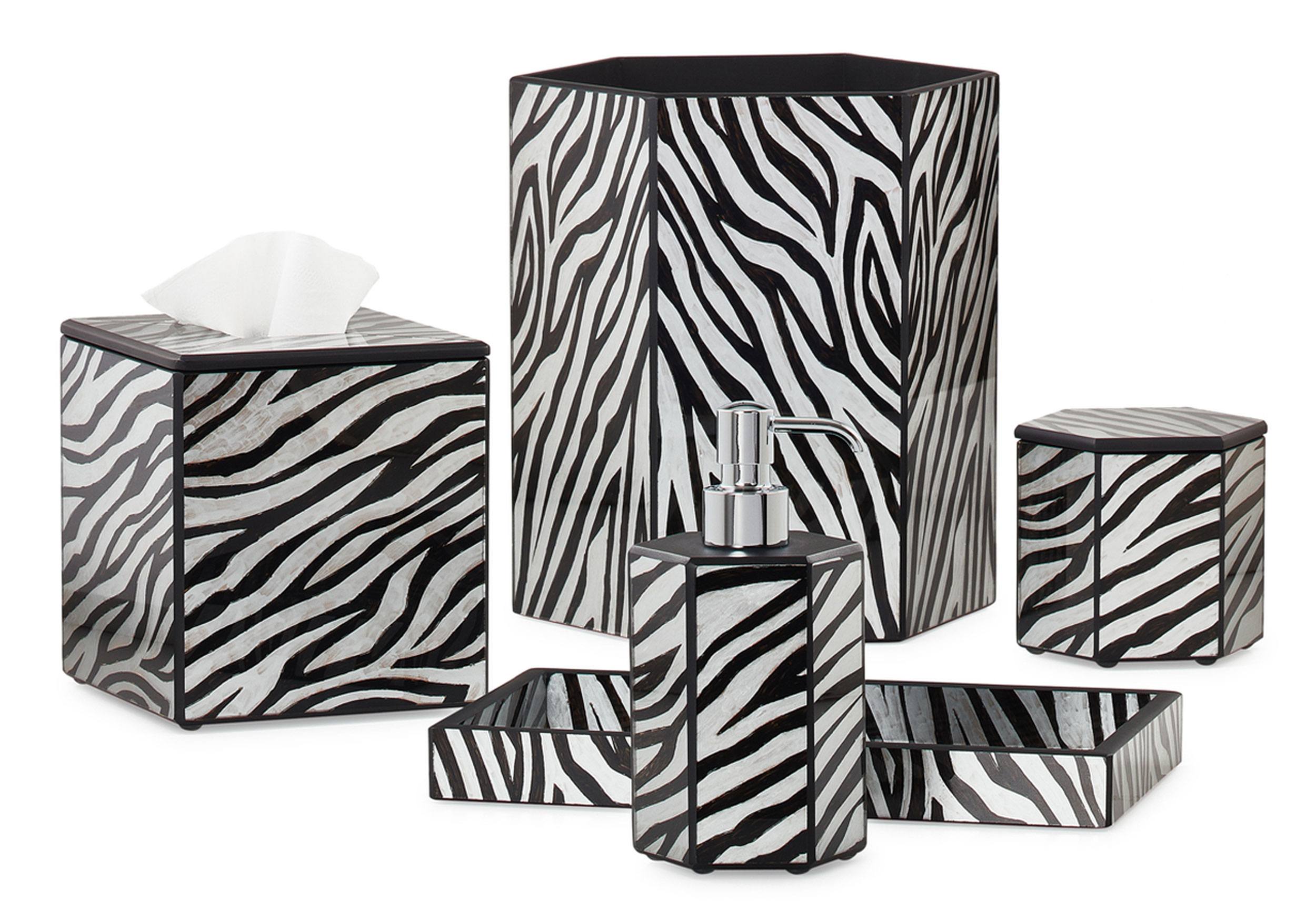 Zebra print bathroom accessories set with tissue box, soap dispenser, and trays.