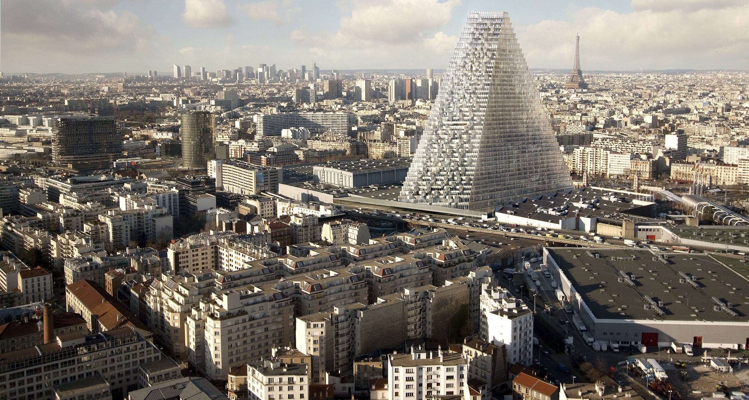 Aerial view of Paris showcasing a modern pyramid-shaped skyscraper with the Eiffel Tower in the background.