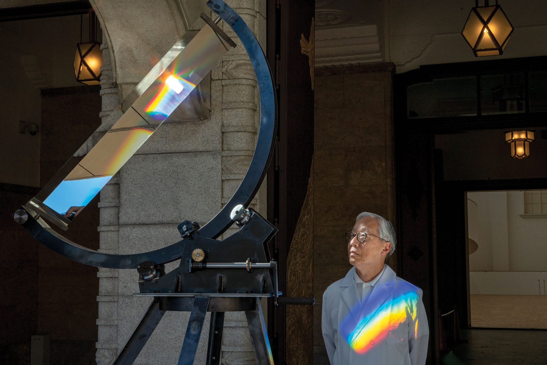 Hiroshi Sugimoto standing alongside the prism that he used to create "Opsticks," a series of new large-scale photographs.