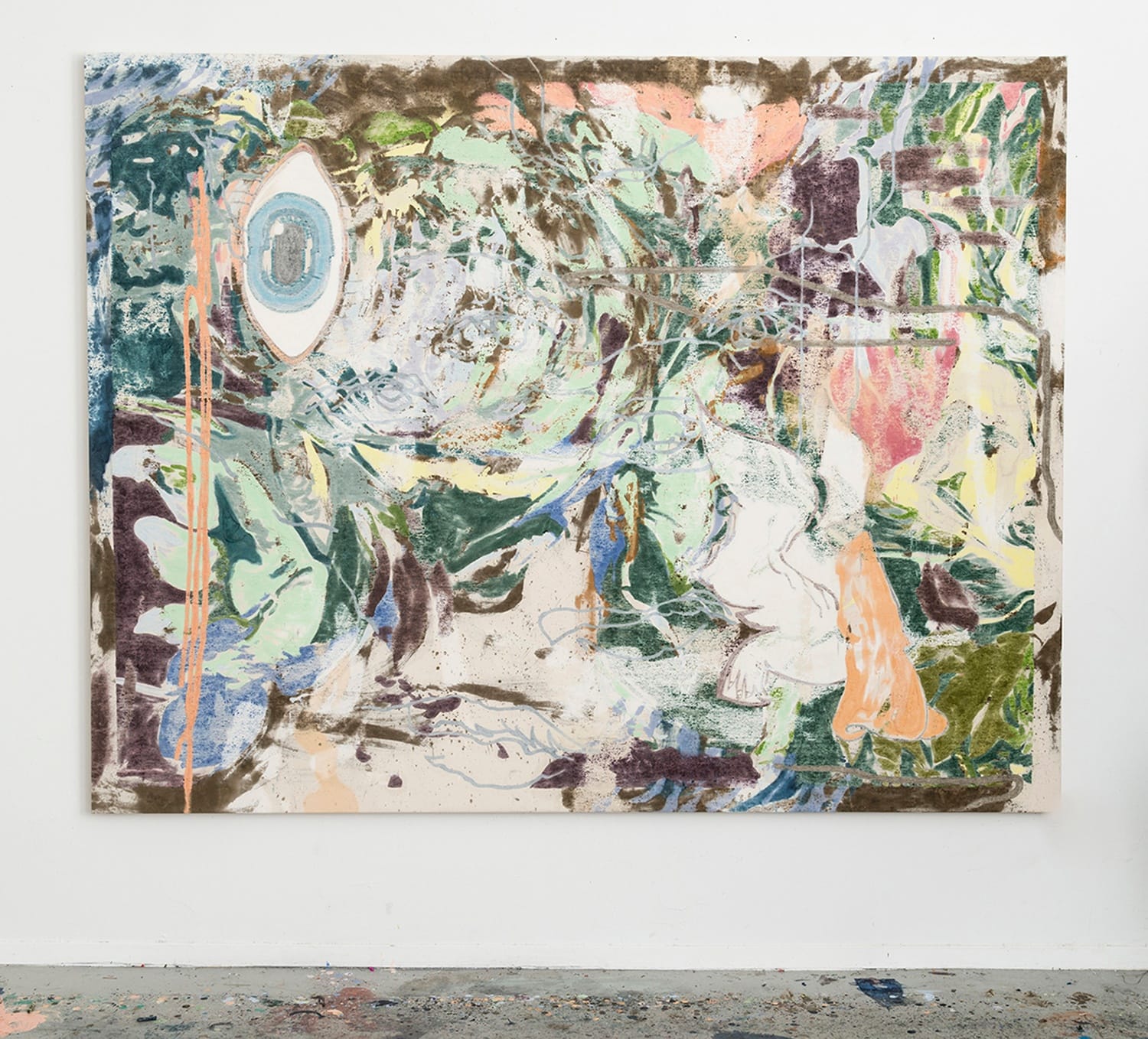 Abstract painting with vibrant colors and swirling patterns displayed on a wall.