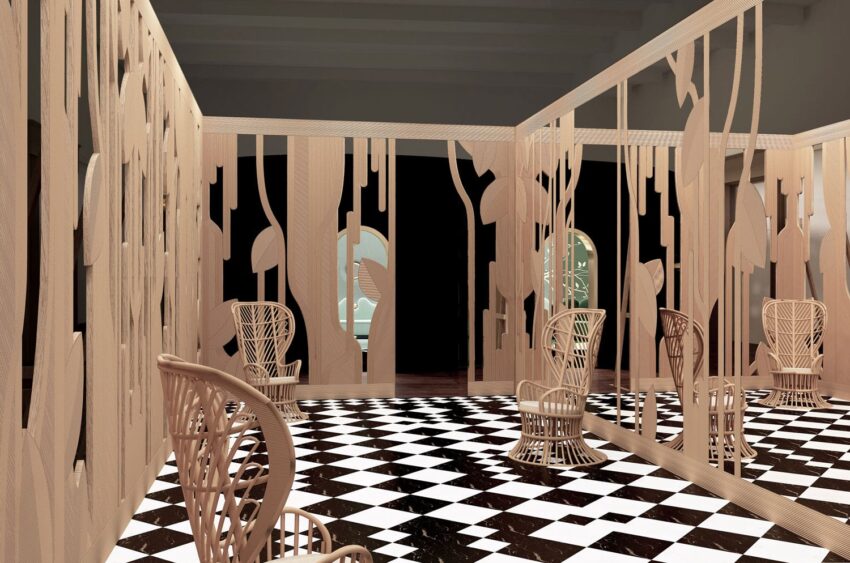 Artistic wooden installation with patterned walls and wicker chairs on a black and white checkered floor.