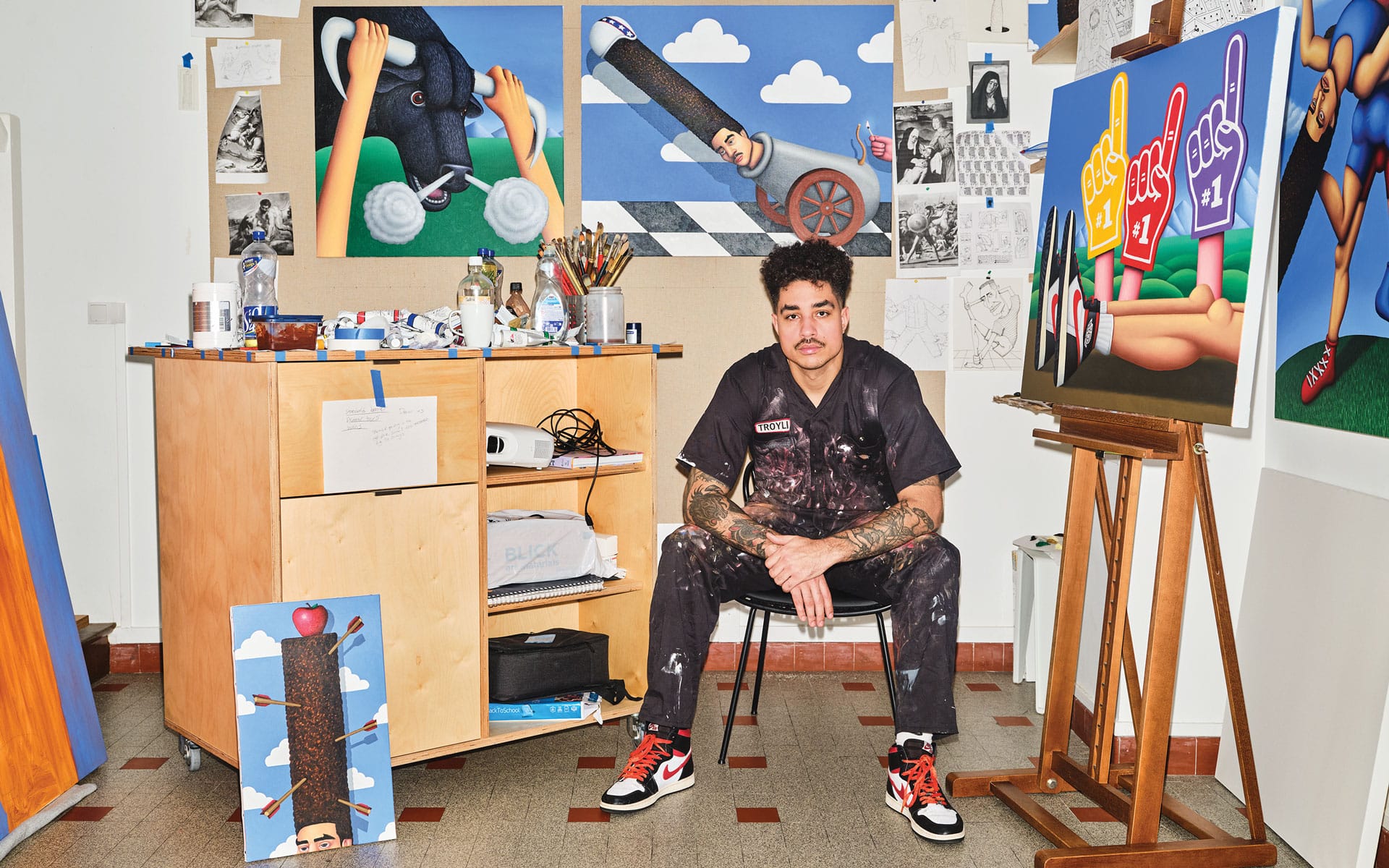 Portrait of Jake Troyli with his art.