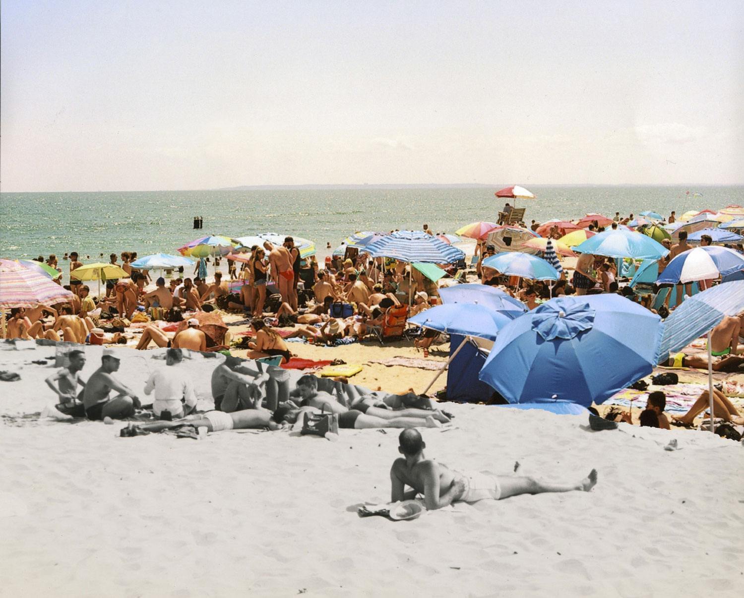 Colorful umbrellas and sunbathers crowd a busy beach under a clear sky, with part of the image in black and white.
