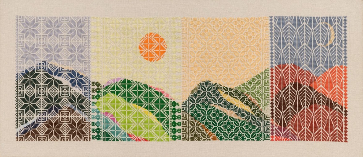 Colorful geometric embroidery of landscapes with mountains, sun, and moon sections, displaying intricate patterns on fabric.