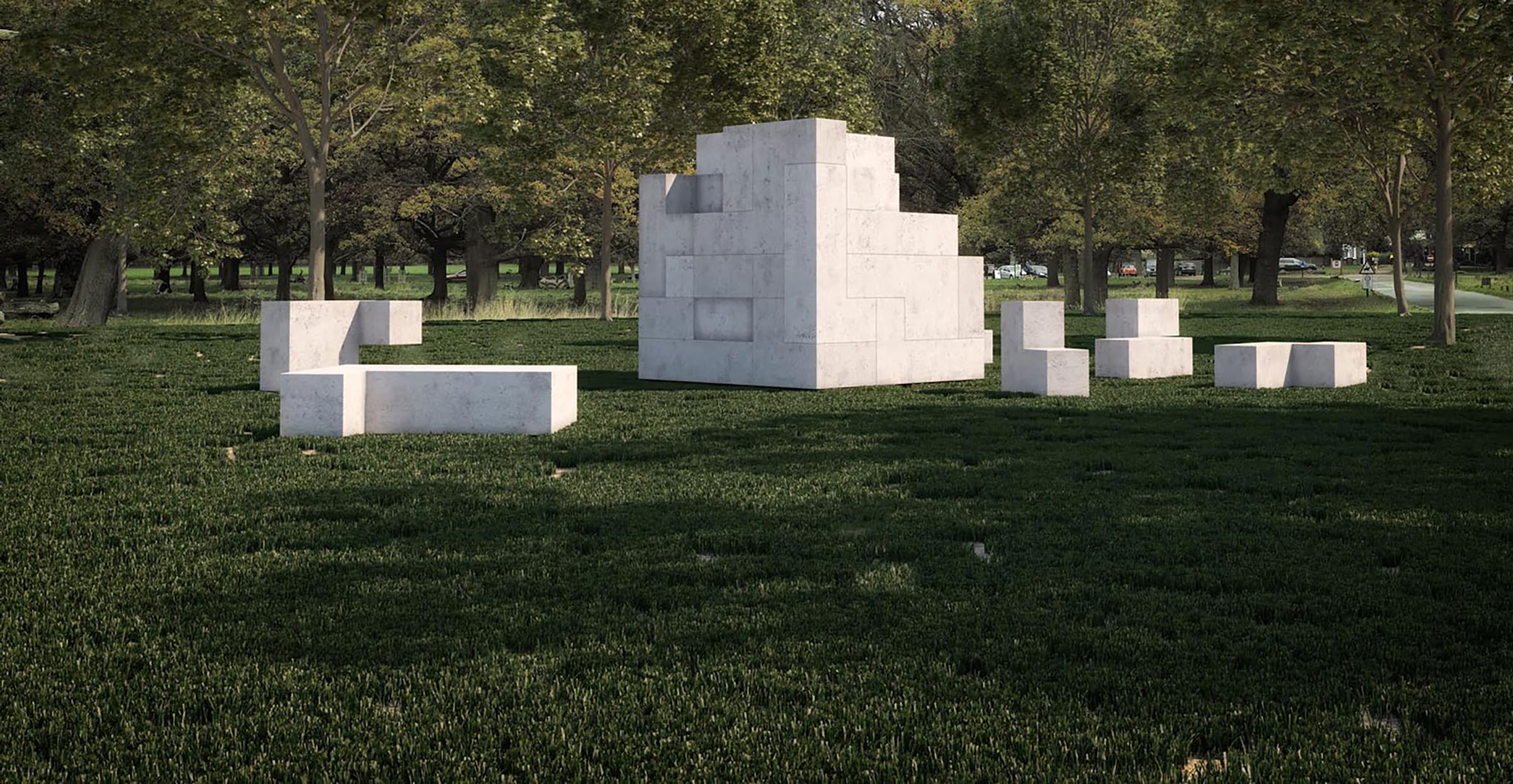 White stone sculptures arranged on green grass in a park with trees in the background.