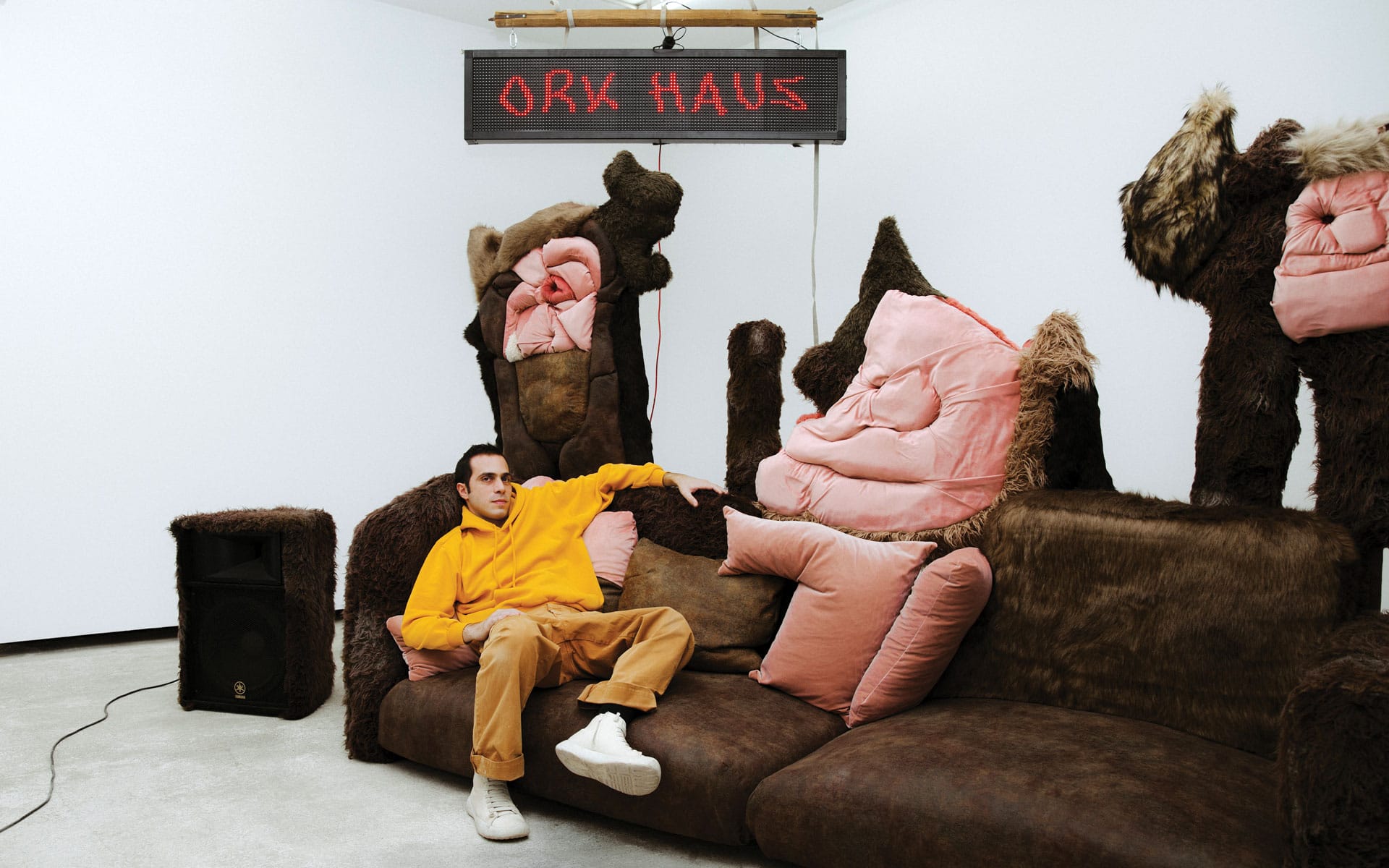 Portrait of Theo Triantafyllidis with an installation.