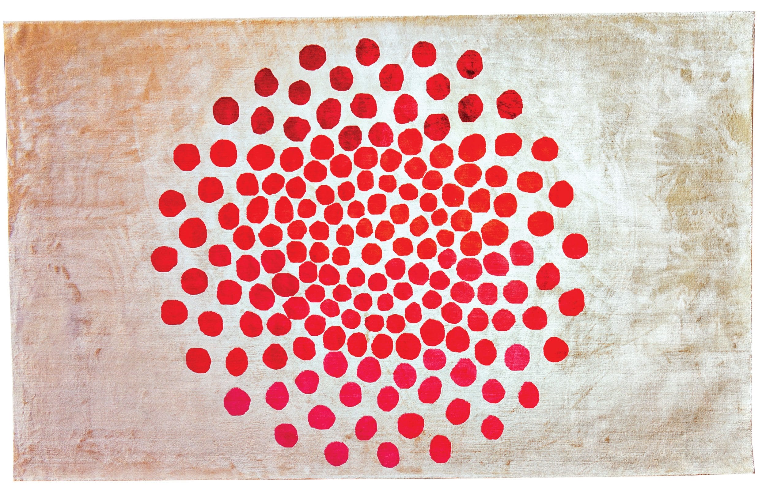 Artistic tapestry with a central pattern of red dots arranged in a circular, expanding formation on a textured beige background.