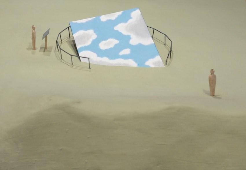 Surreal art with three wooden figures observing a sky painting on the ground, surrounded by a metal railing in a desert setting