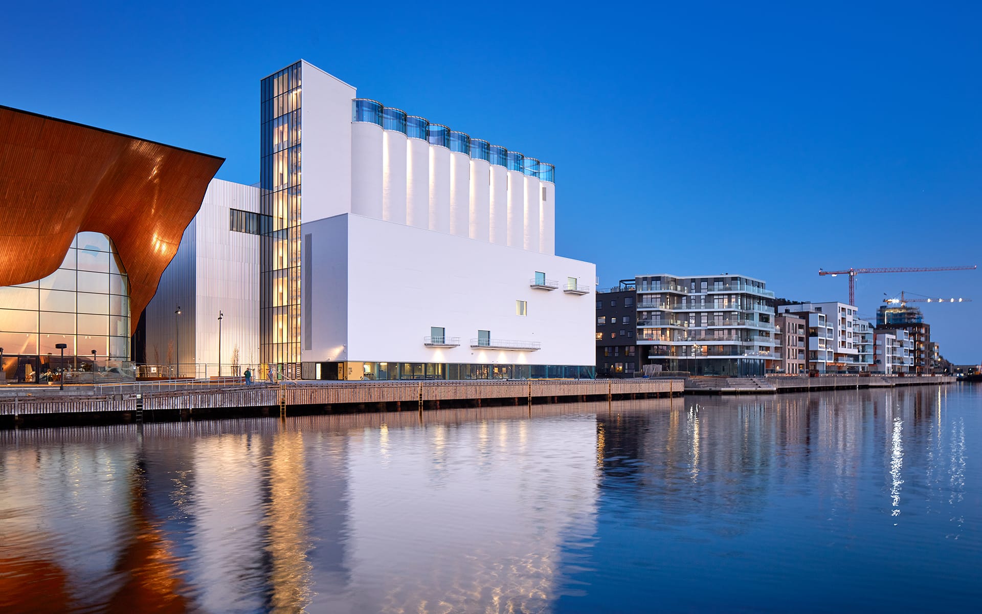 Kunstsilo, a new museum of Nordic Art, a opened in Kristiansand, Southern Norway. The 8,500 square-meter building emerges on the waterfront in the peninsula of Odderøya, and integrates for the first time the Southern Norway Art Museum and the prestigious Tangen Collection of Nordic art.