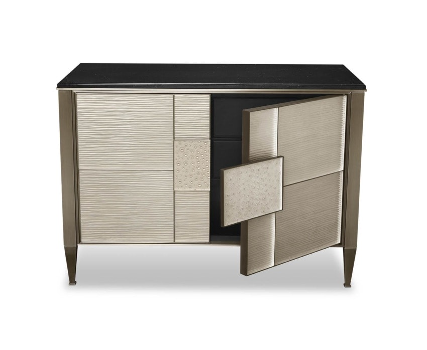 Modern sideboard with textured doors, sleek black top, and open storage space, showcasing contemporary design elements.