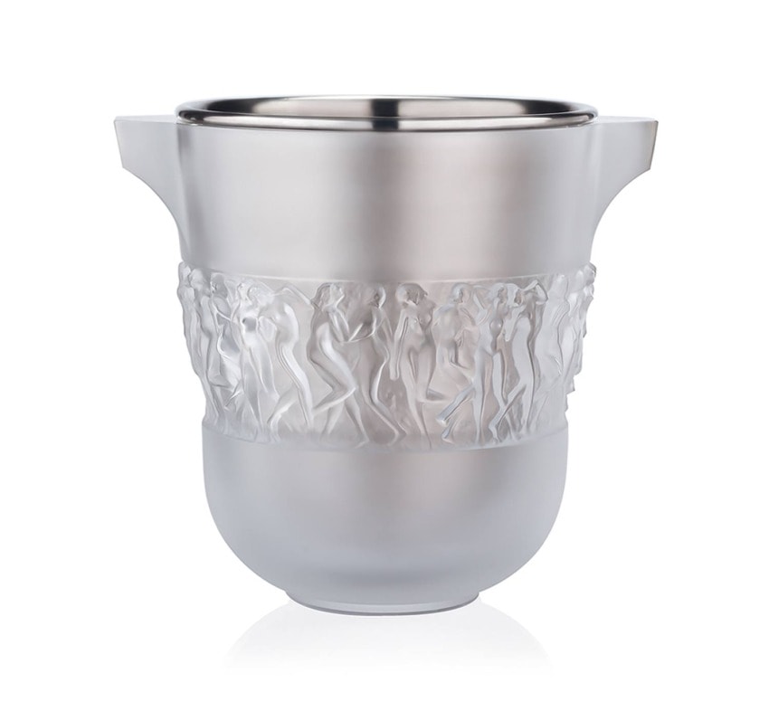 Silver ice bucket with intricate embossed design featuring figures dancing in a classical style.