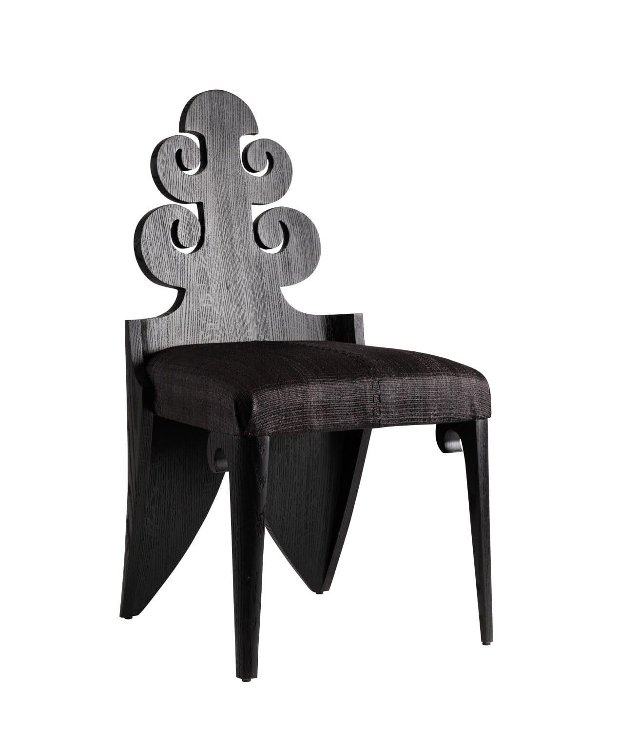 Unique black wooden chair with an intricate carved backrest and cushioned seat, featuring a modern, artistic design.