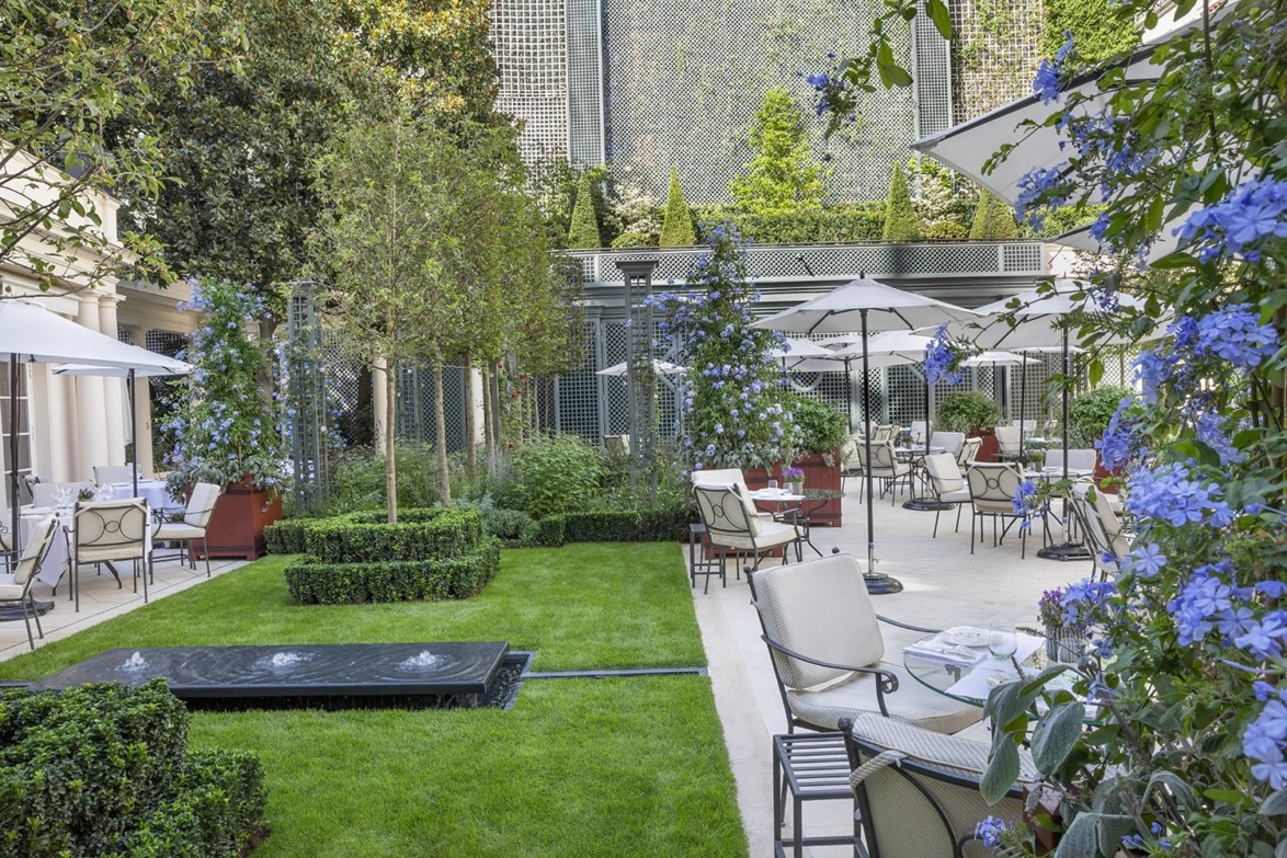 Arabella Lennox-Boyd designed the custom maroon planters that help put Le Bristol Paris make the list of Paris hotels