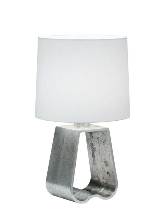 Modern table lamp with a white cylindrical shade and a unique U-shaped concrete base