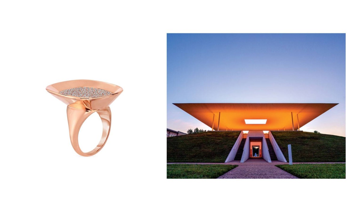 Rose gold ring with textured surface and a modern architectural structure with a glowing top and pathway at sunset.