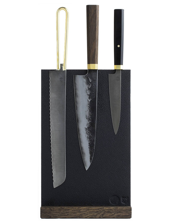Living Steel's leather and oak magnetic knife block, loop bread knife, gyuto, and paring knife.