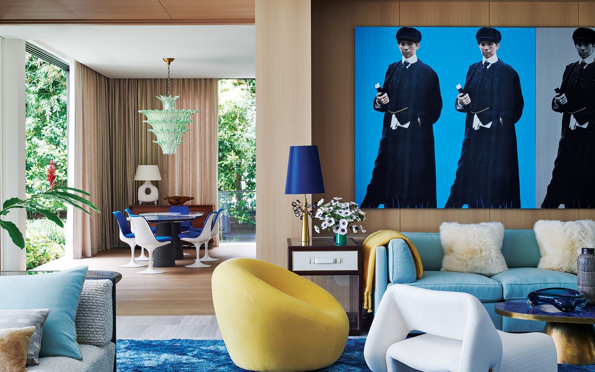 The painting Double Double Yentl (My Elvis) by Deborah Kass presides over the living room of a Miami Beach home renovated by William T. Georgis.